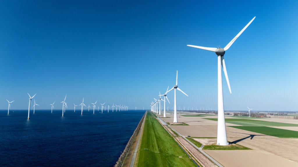 Expansive offshore windmill park in the Netherlands harnessing renewable energy.